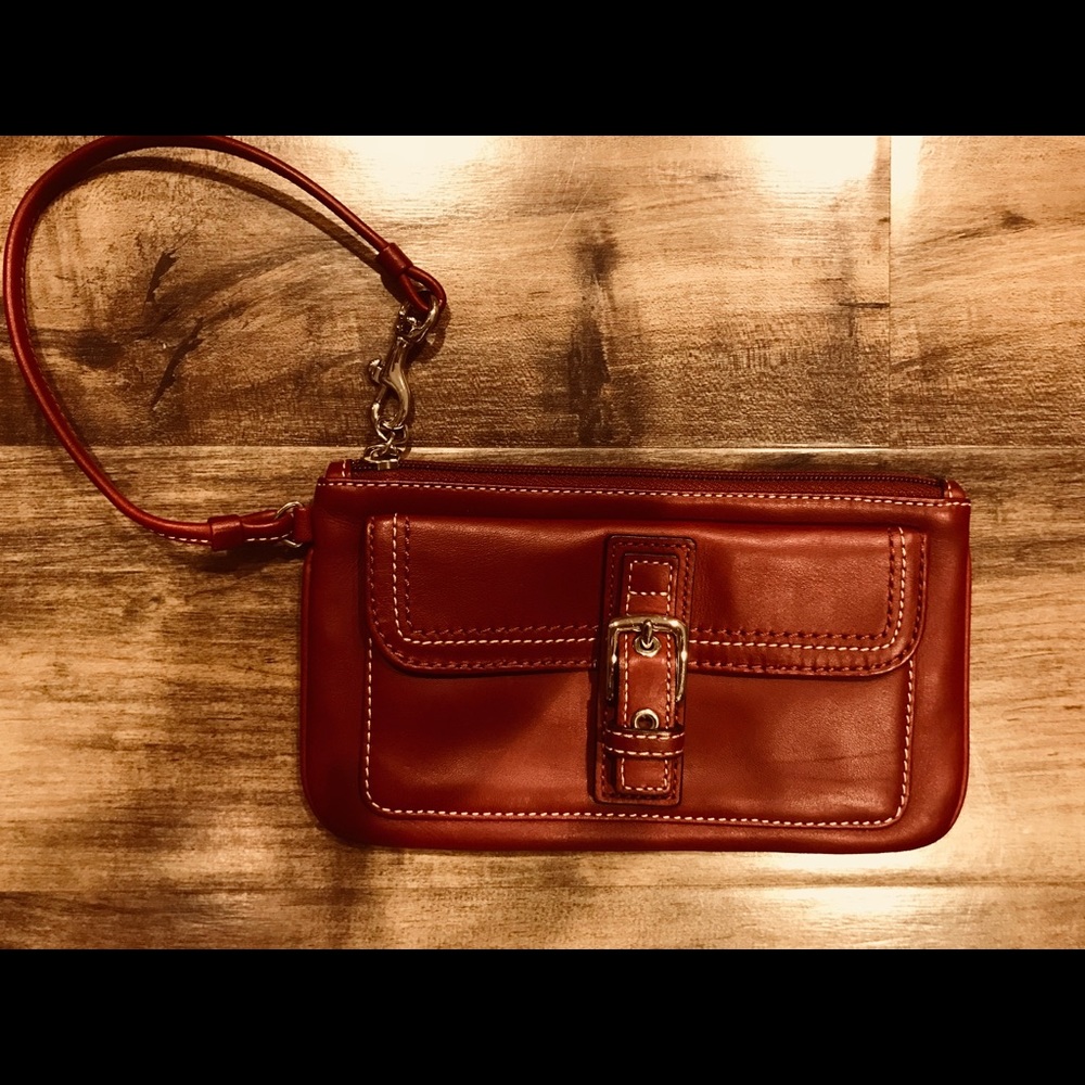 Oxblood coach wristlet